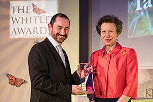 Ian Little, receiving the award from HRM Princess Ann