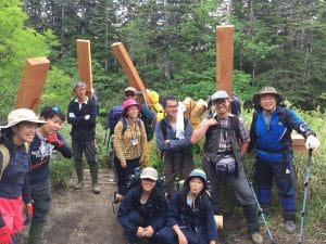 Fig. 4: A tour to carry necessary materials to repair and maintain trails (11 August 2017) This tour was organized by the Ministry of the Environment as an activity on the Japanese Mountain Day (a national holiday on every 11 August), which was started in 2017 after long discussion and preparation initiated by the International Year of Mountains. This type of volunteer activities is increasing in Daisetsuzan National Park (Photo: TW).